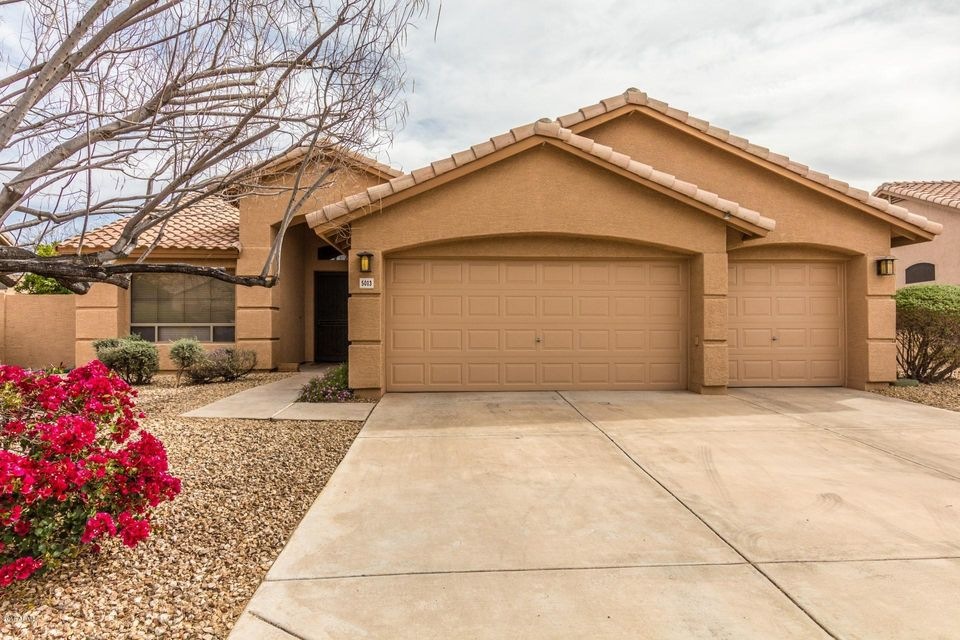 Three car garage in Tatum Ranch.
