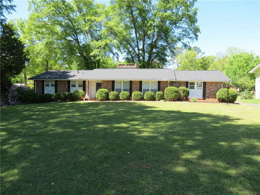 Beautiful timeless traditional brick home!