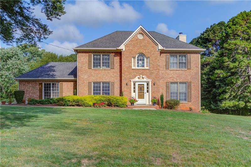 1452 Hartman Dr SW, Lilburn, GA 30047 - photo 1