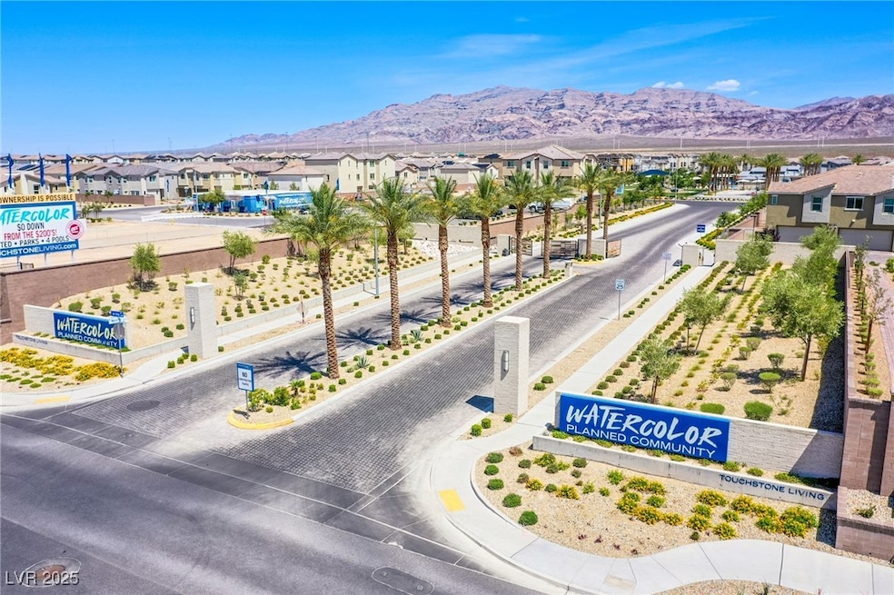 Aerial view of residential area featuring a mounta