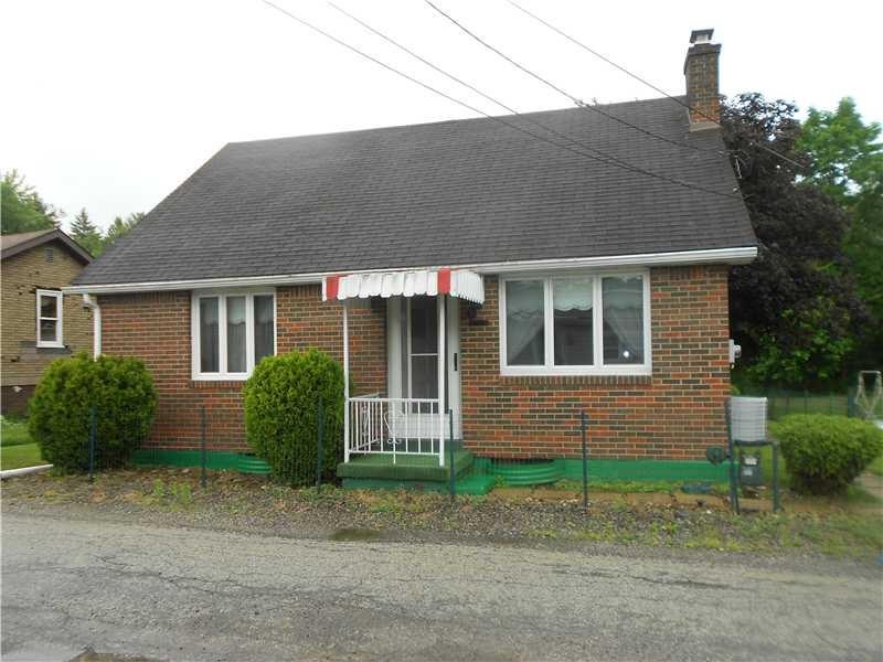 Exterior Front. BRICK CAPE COD ON FLAT, FENCED LOT