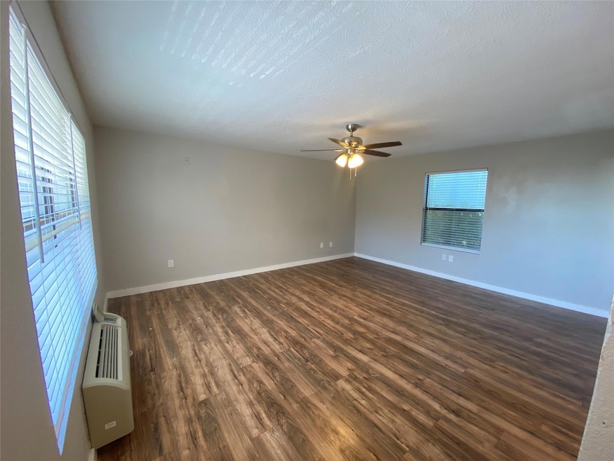 Here is a nice view of this spacious living area. 