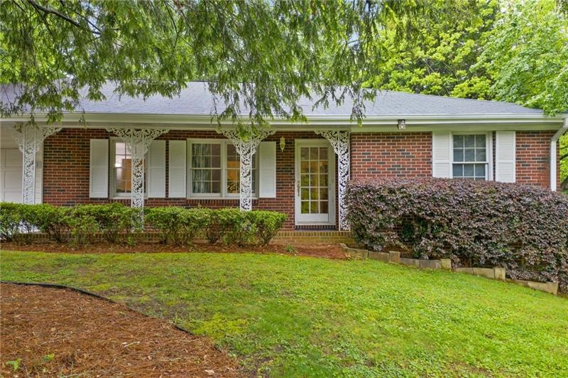 Welcome home to your classic brick ranch in the he