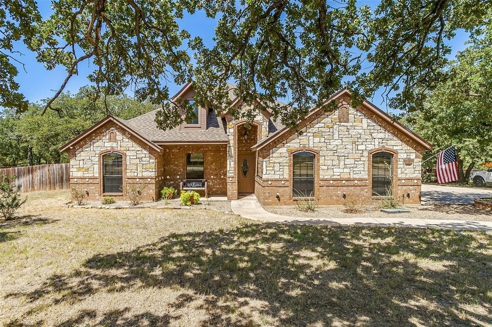 390 Sessums Rd, Springtown, TX 76082 - photo 1