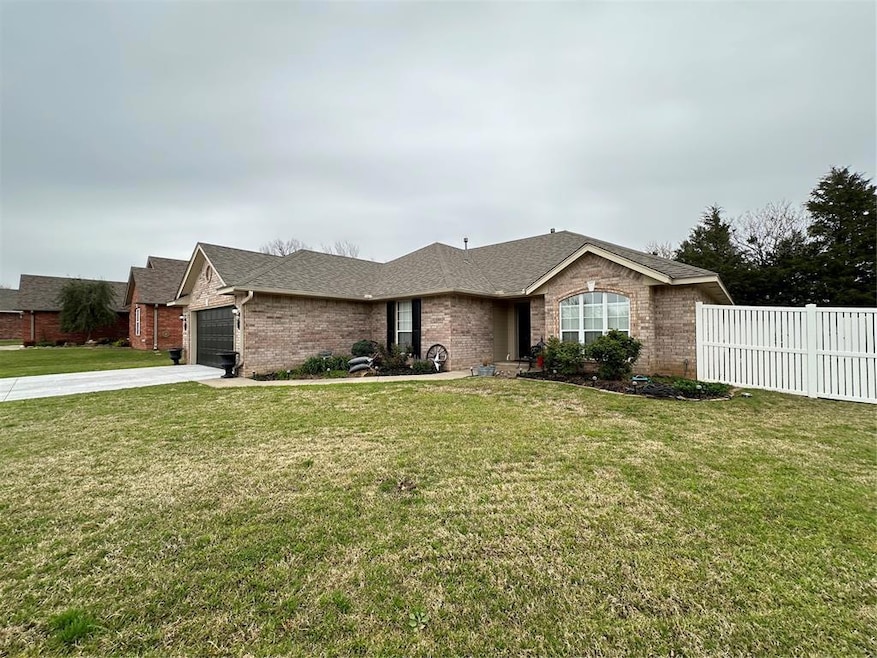 Nice front lawn and landscaping at entry.