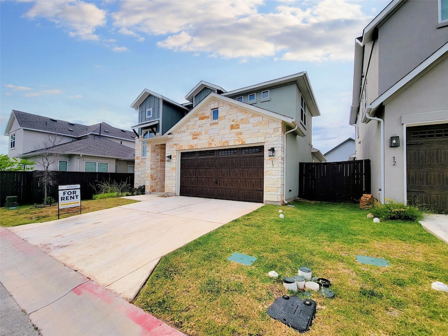 View of front of property with stone siding, an a