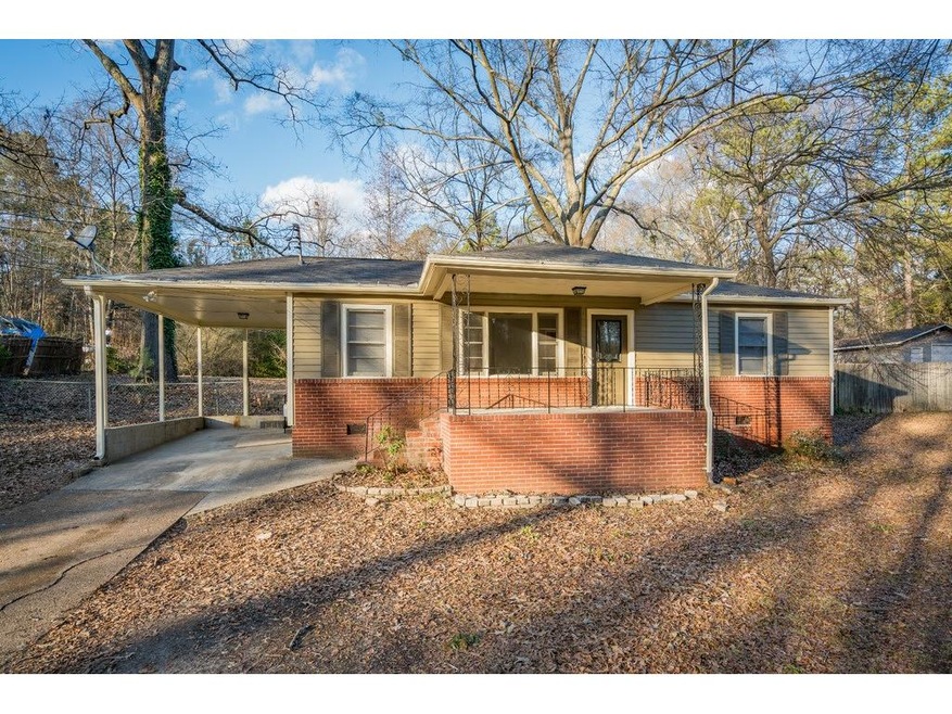 CHARMING THREE BEDROOM HOME WITH CARPORT