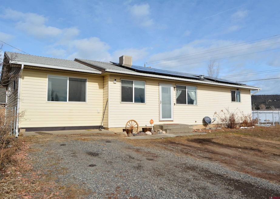 215 1/2 NE 4th St, Cedaredge, CO 81413 - photo 1