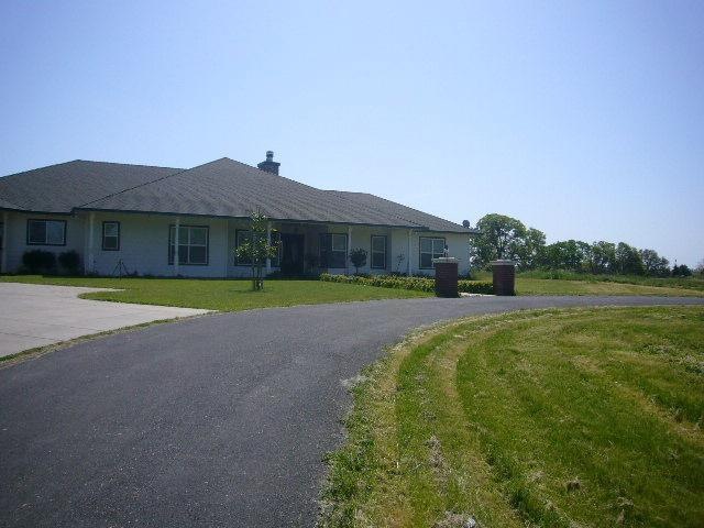 Welcome to 5411 Saharan, Cal Pak roof with heat resistant energy efficent..  Circular Driveway