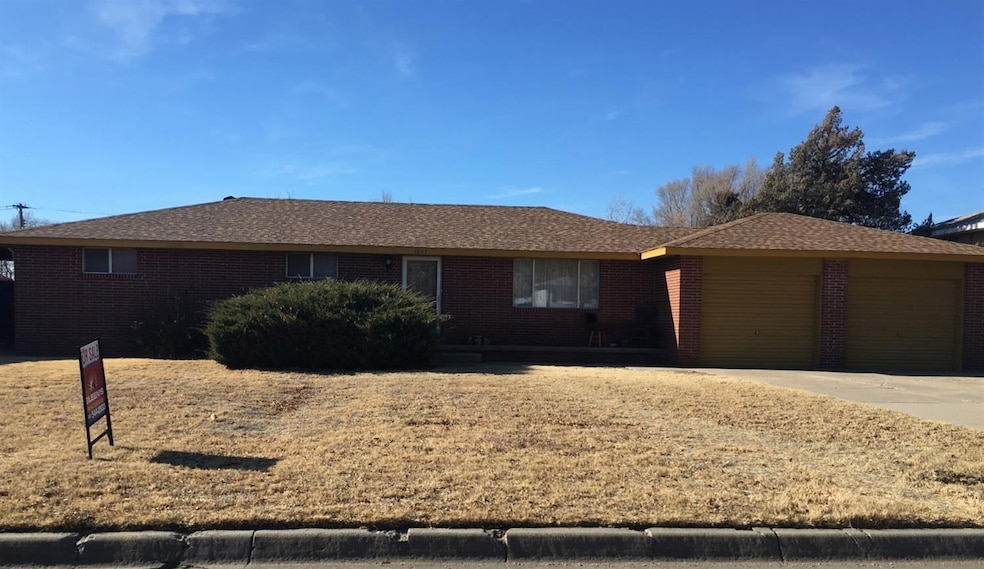 1207 S Madison St, Hugoton, KS 67951 - photo 1