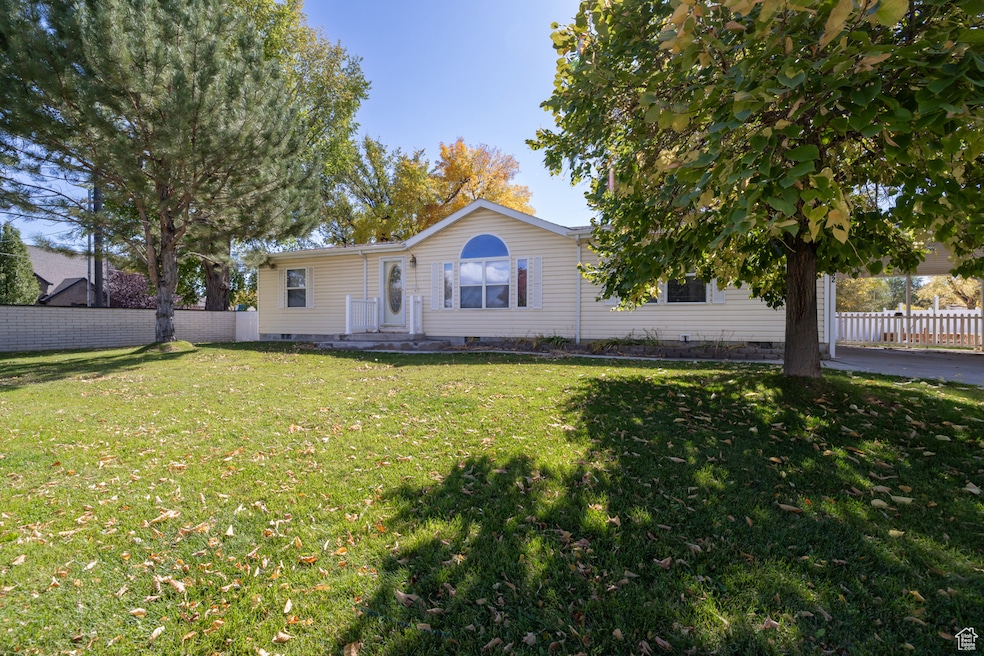 View of front of property featuring crawl space and a patio area