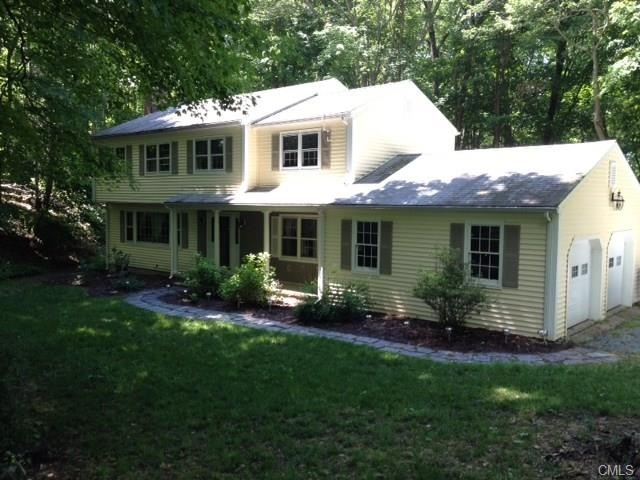 Center Hall Colonial with front porch, Vinyl sided