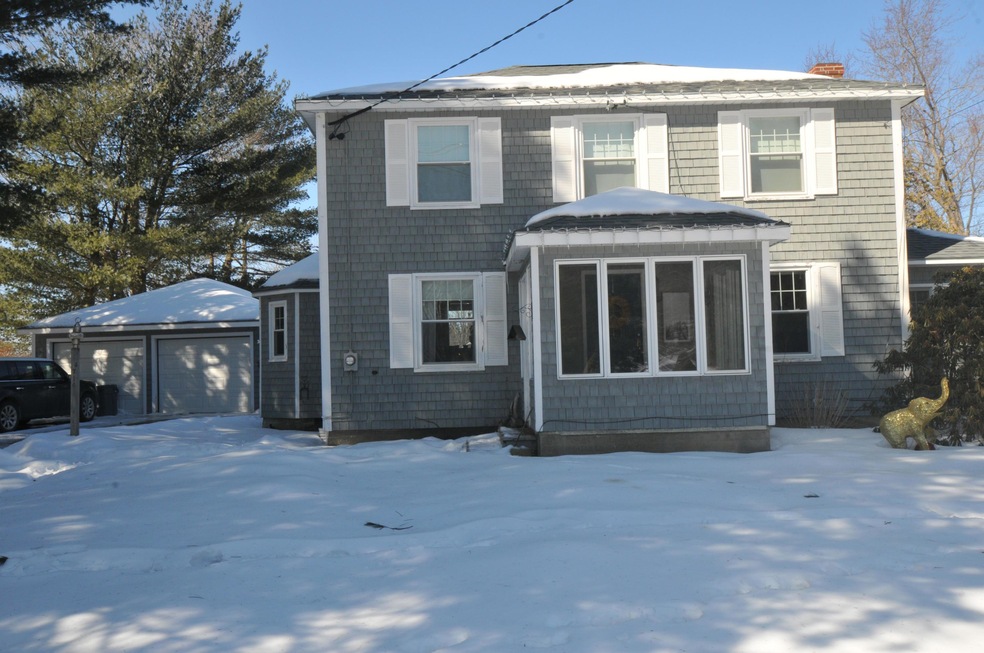 Front of home with sun porch