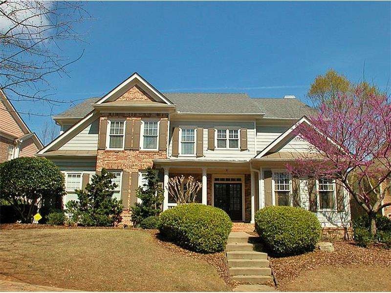Immaculate Craftsman 5 BR/4.5 BA Home with open fl