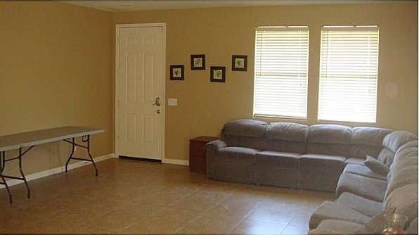 family room with Nuetral tile