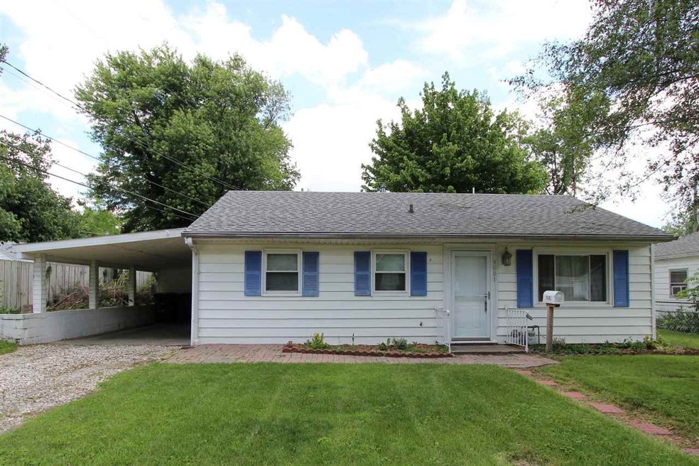 This beautiful home has a large carport and a full