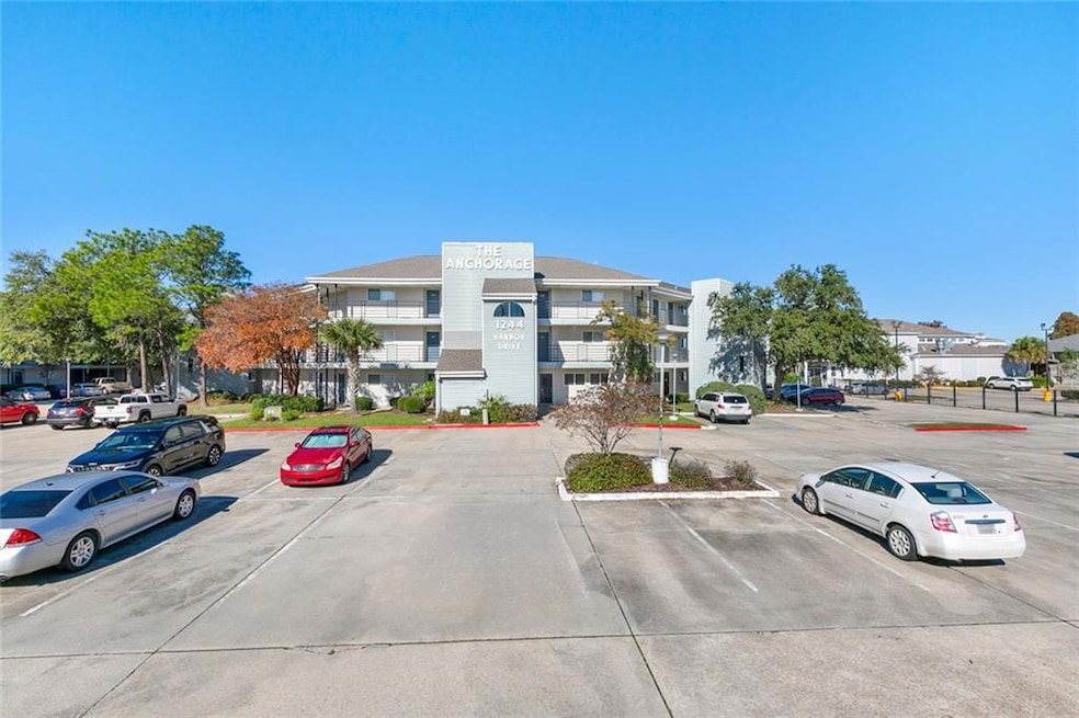 Front of Condo and Parking Lot