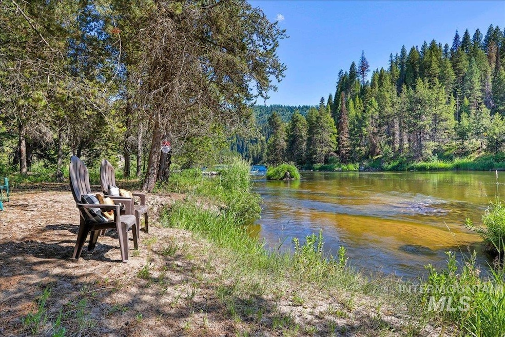 Water view featuring a forest