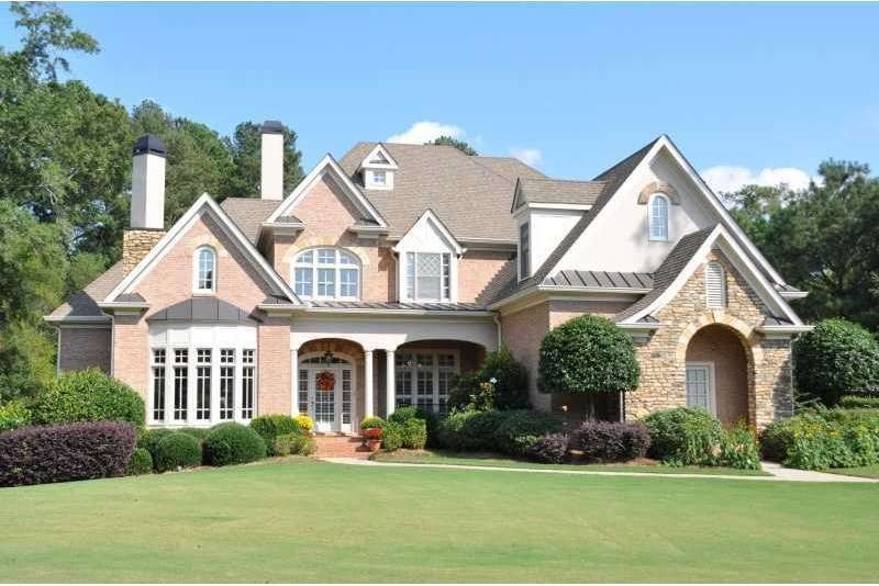 Exterior Front. Custom brick/stone home in Milton 