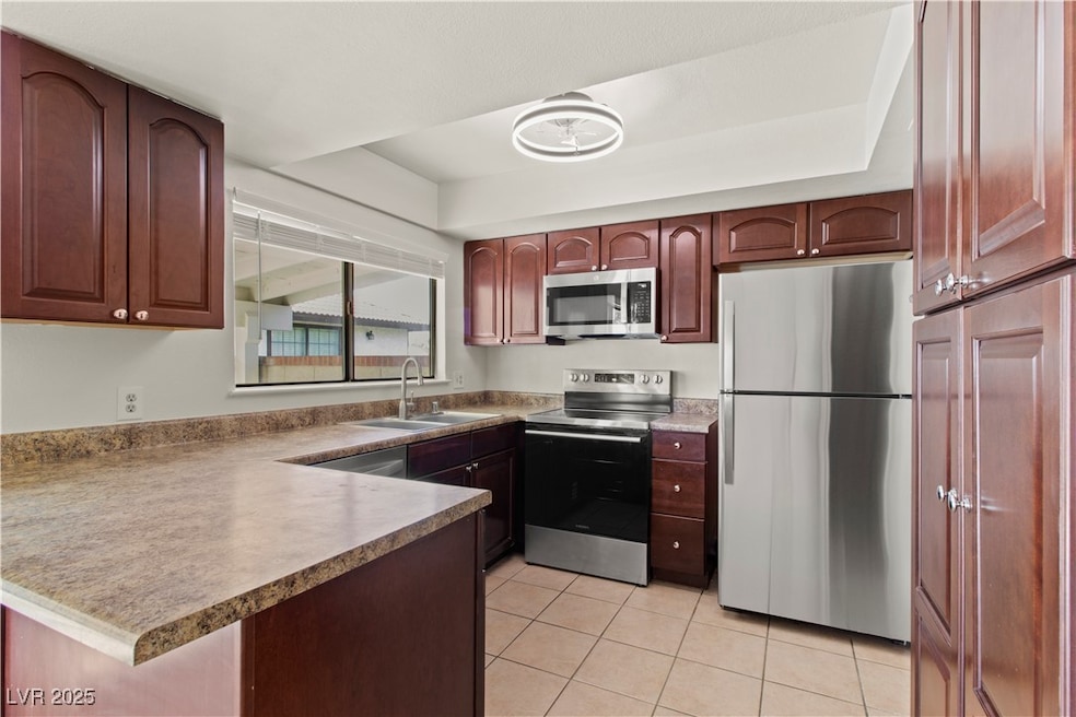 Sleek designer kitchen featuring brand-new stainle