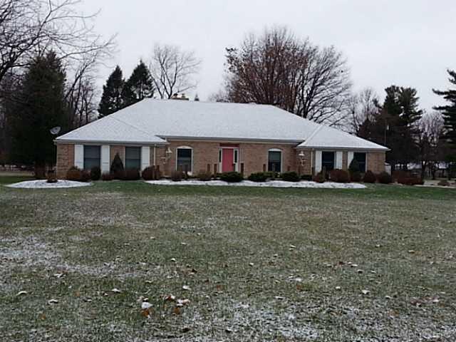 Exterior Front. Sprawling brick ranch on a1.3 acre