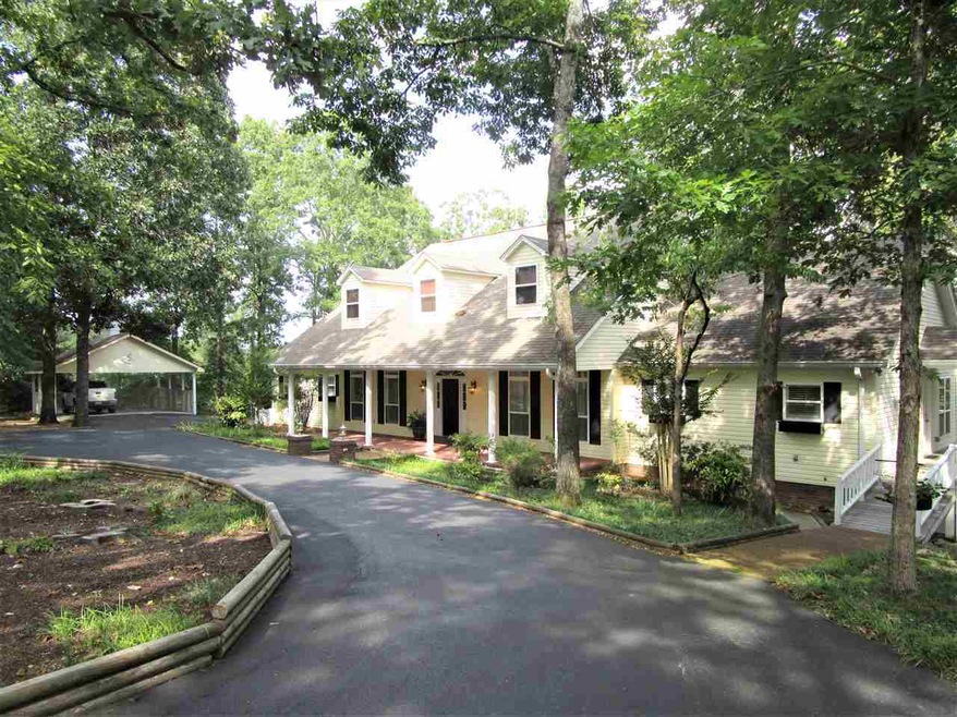 Custom built lakehouse, circular drive, 2 acres on