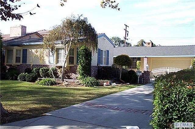 Beautiful Ranch Rambler w/ gated entry to courtyar