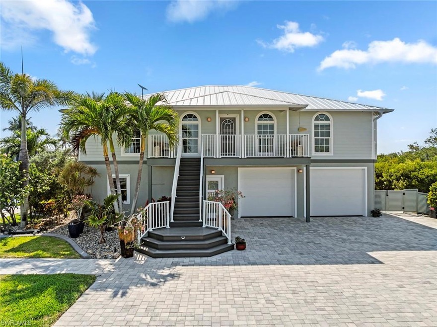 Coastal inspired home featuring an attached garage