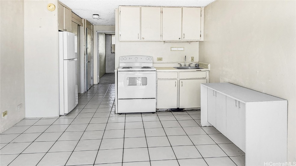 Kitchen and hallway *Virtually enhanced*
