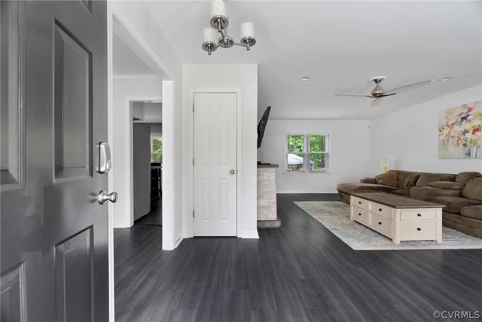 Entrance foyer with ceiling fan with notable chand