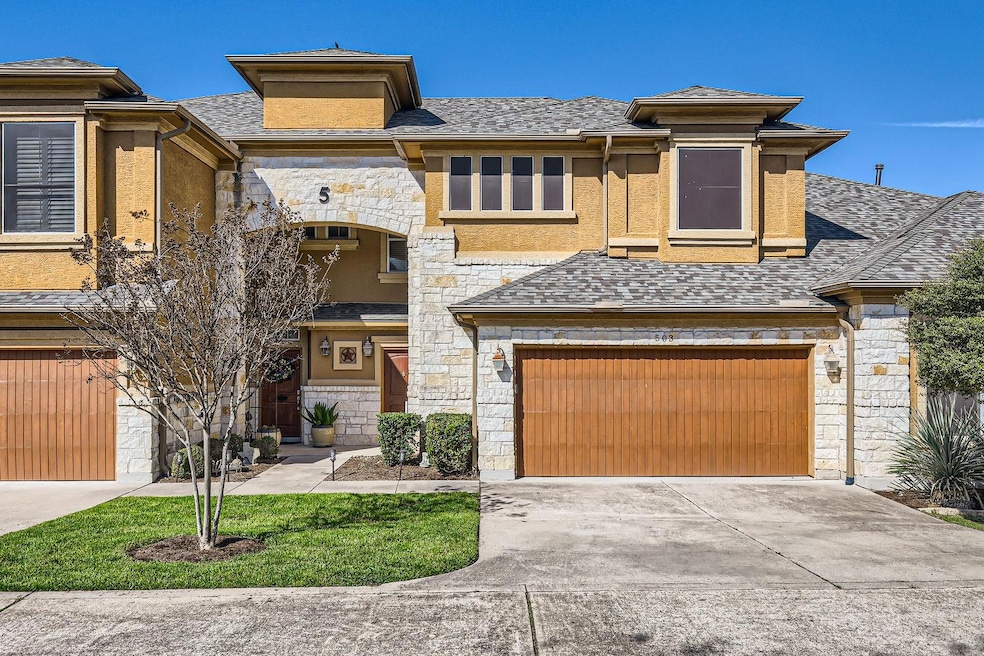 View of front of house with an attached garage, a