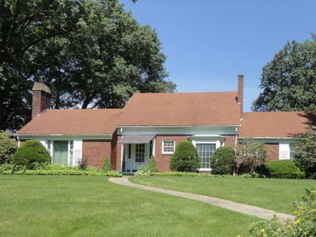 Exterior Front. Lovely 4 bedroom, 3 bath, Cape Cod home w/family room, heated patio, 2 car-attached garage.