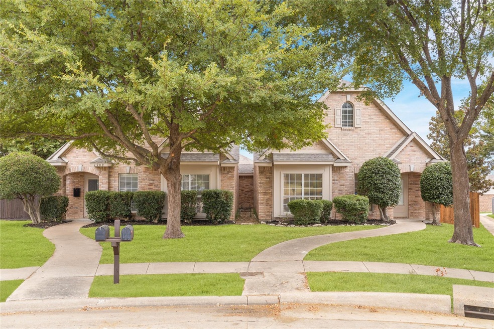 View of front of property with a front lawn