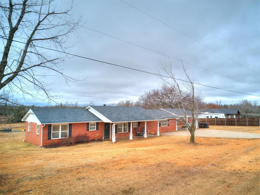 Front view of house, it faces East.