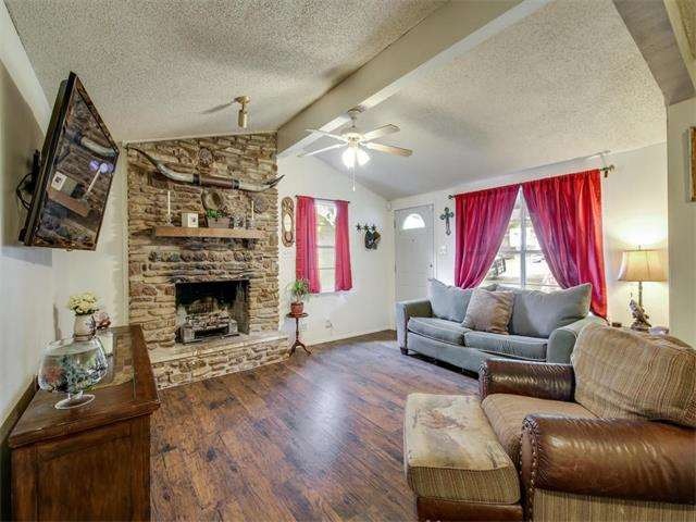 Gorgeous floor-to-ceiling stone, wood-burning fire
