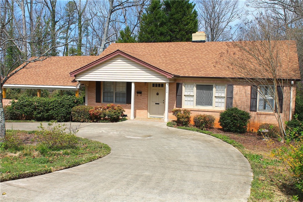 Front of House w/ Semi-circular Driveway