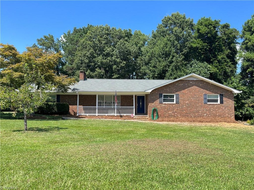 Brick ranch with basement and one car garage