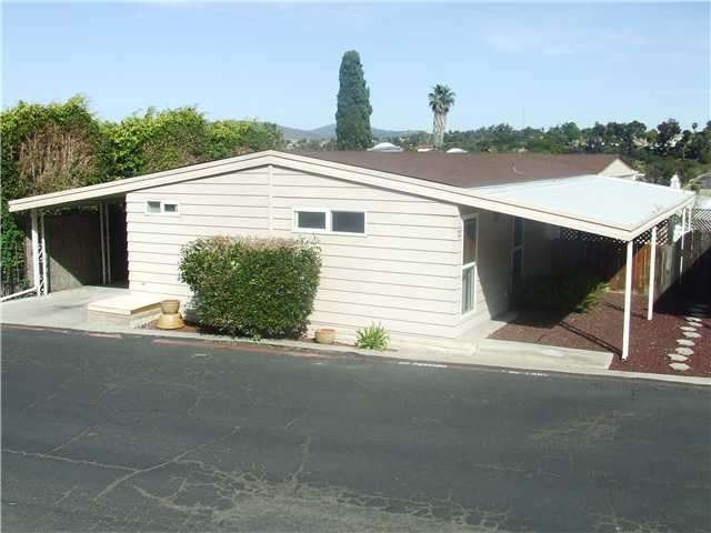 Curb appeal from terraced view above.