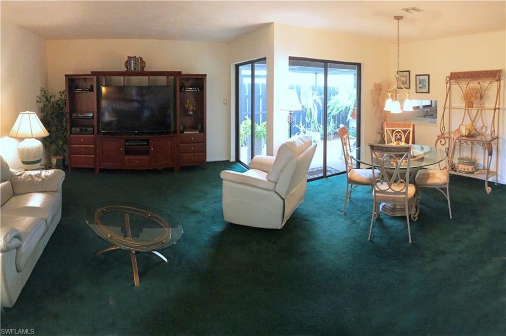 Spacious Great Room with sliders to the courtyard.
