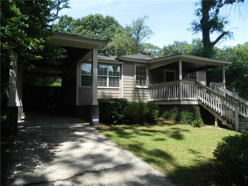 Welcome to 5218 Azalea Cir S! Driveway to Tall car