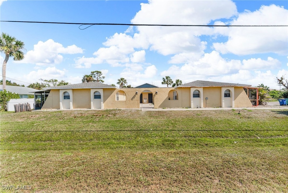 View of front of property featuring a front yard
