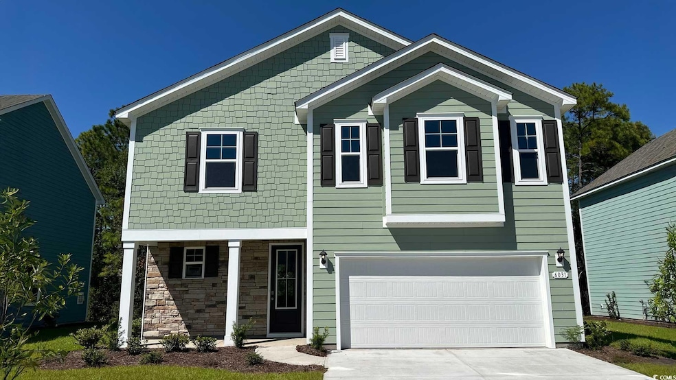 Craftsman inspired home with driveway, a garage, stone siding, and covered porch