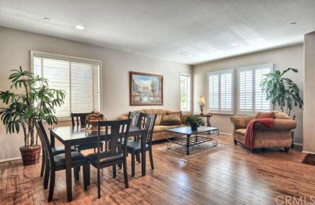 Pretty and bright, formal living room and dining r