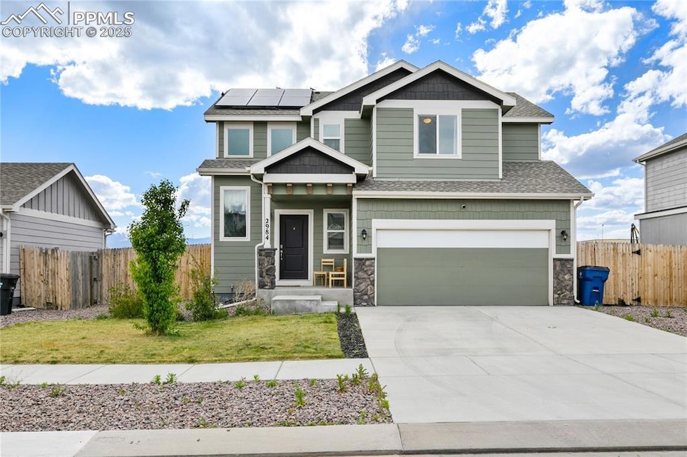 Craftsman house featuring roof mounted solar panel