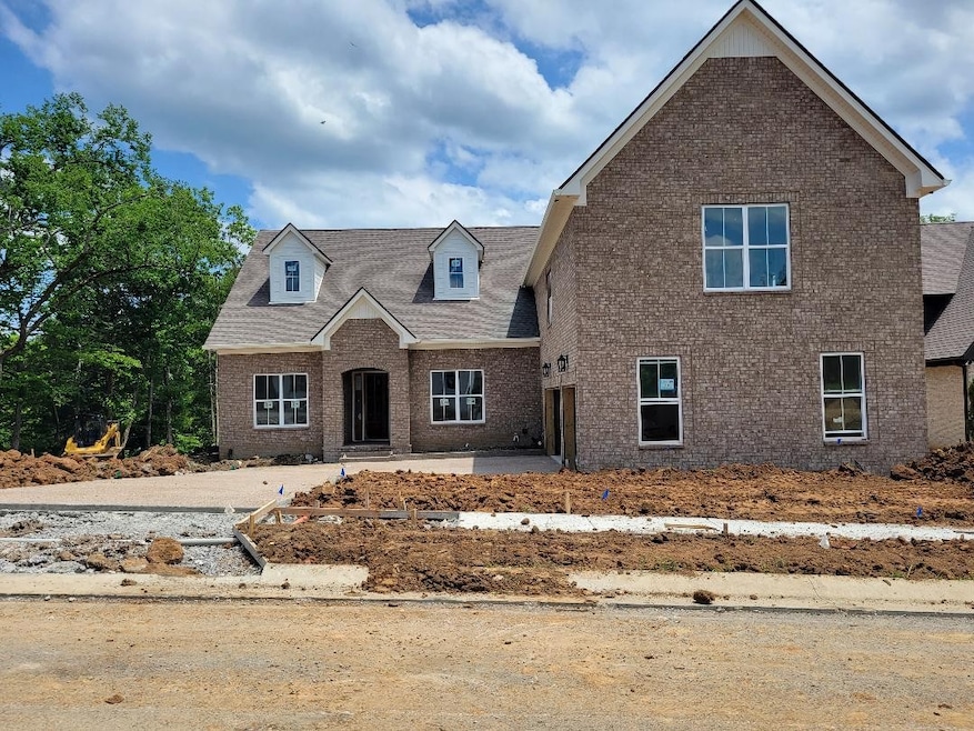 Keep watching as home progresses!  Five bedroom beauty with three bedrooms down and two up. Unique layout. Extensive sand and finish hardwoods and trim package.