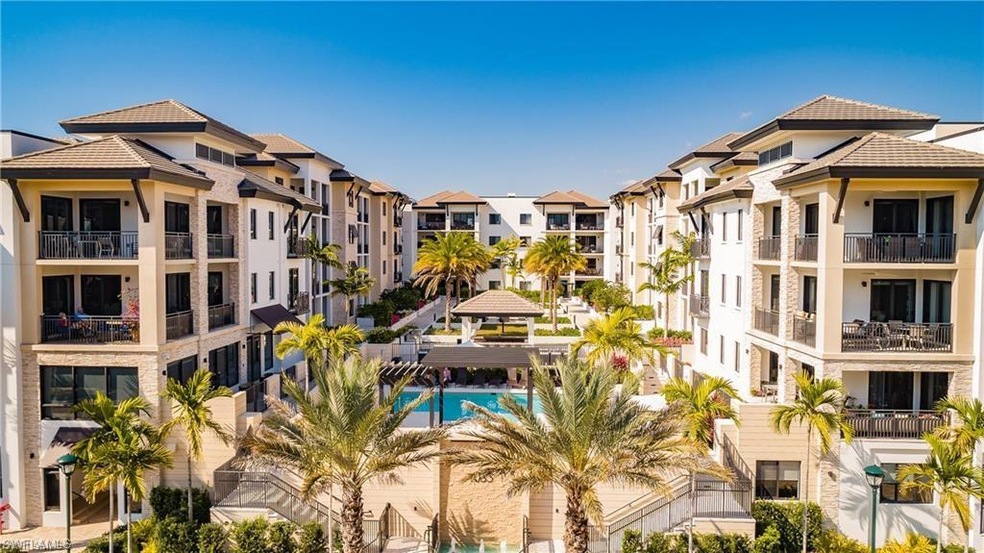 View of property featuring pool.