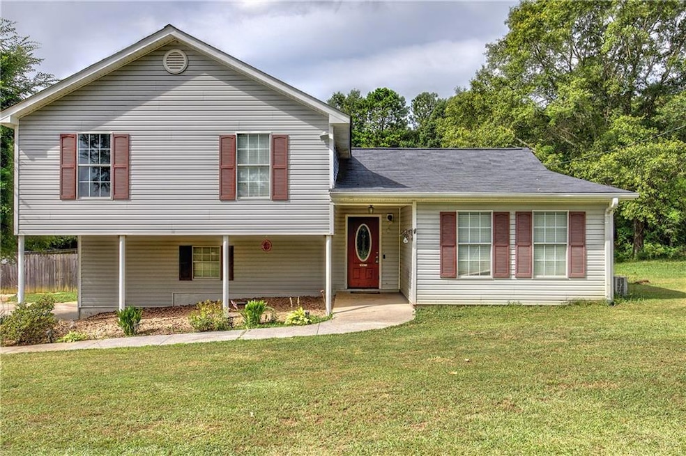 View of front of home with central air condition u