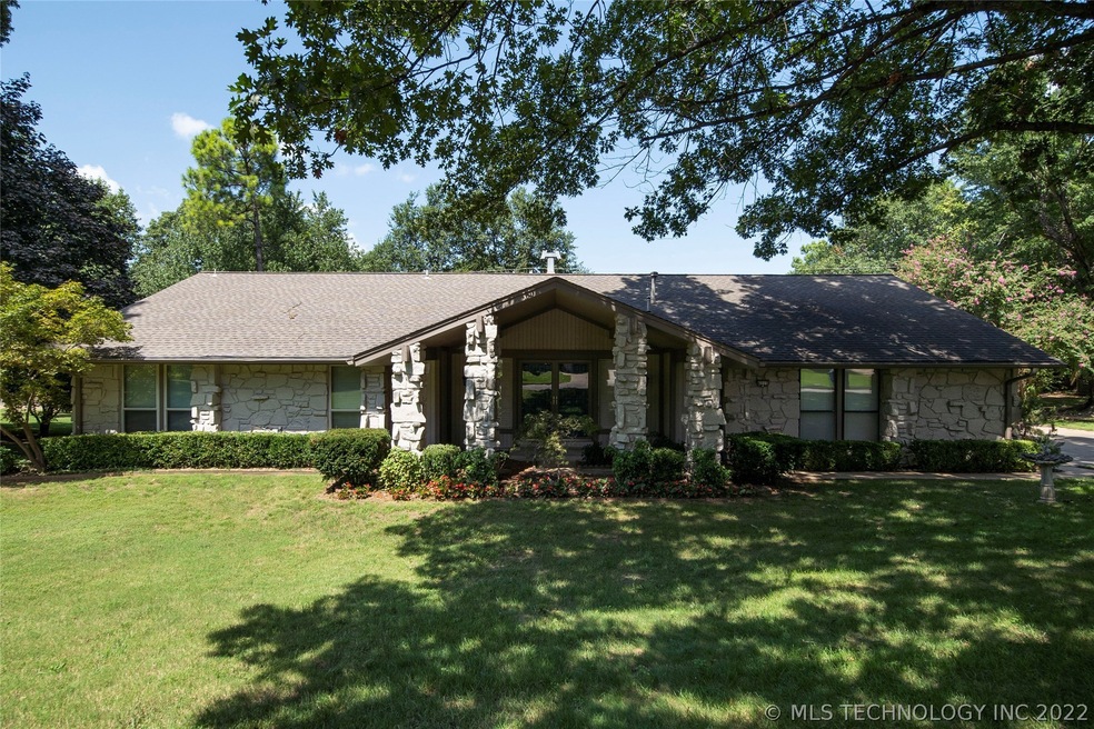 Updated single story lot nestled on a large lot un
