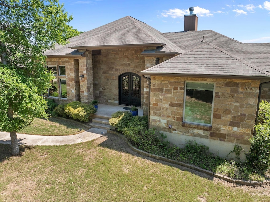 View of front of property featuring french doors,
