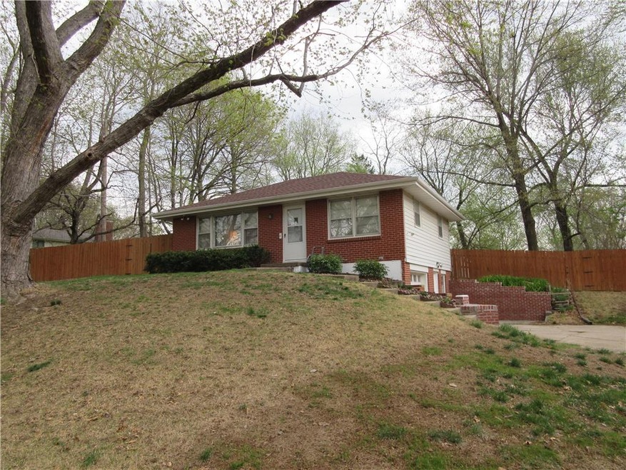 Raised Ranch with Brick Front and Steel Siding.  S